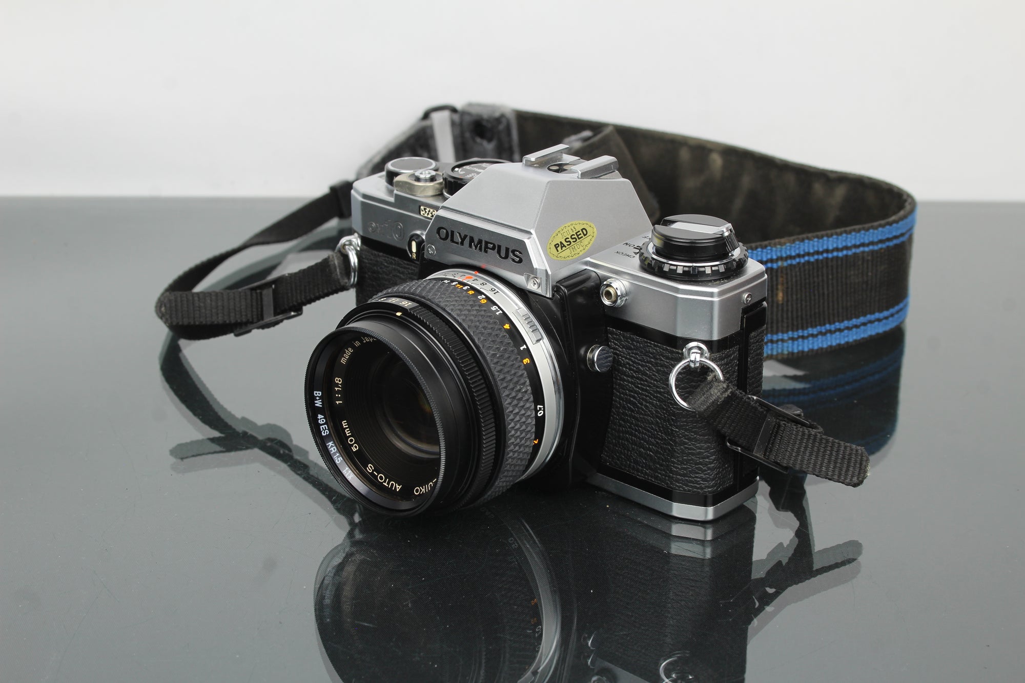 Olympus OM 10 + lente Olympus 50mm 1:1.8
