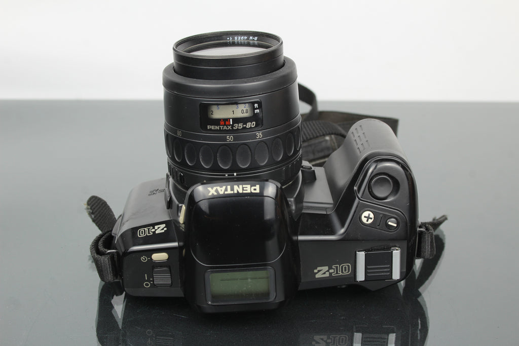 Pentax Z-10 + lente 1:4-5.6 35-80mm