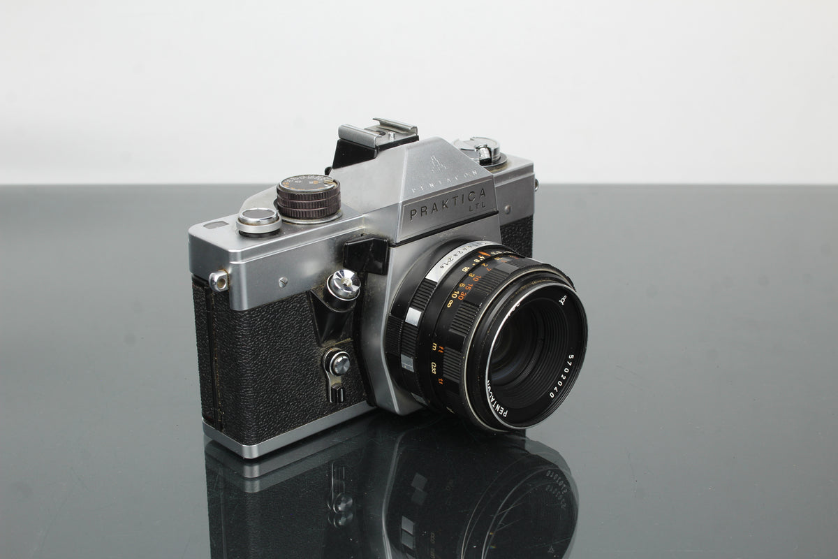 <tc>Praktica</tc> LTL + Lente Pentacon 1.8/50