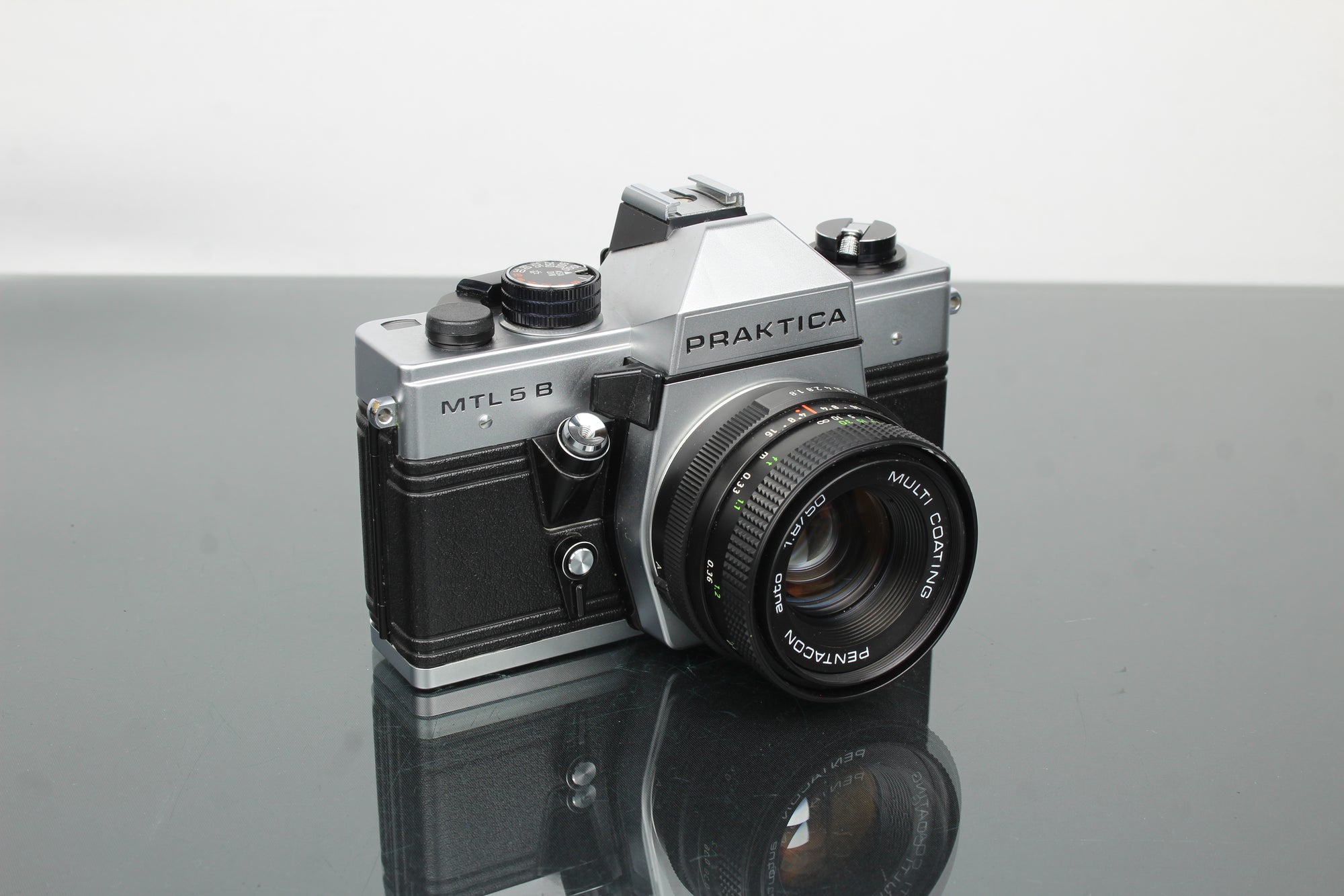 Praktika MLT 5 B + Lente Pentacon auto 1.8/50 (montagem M42)