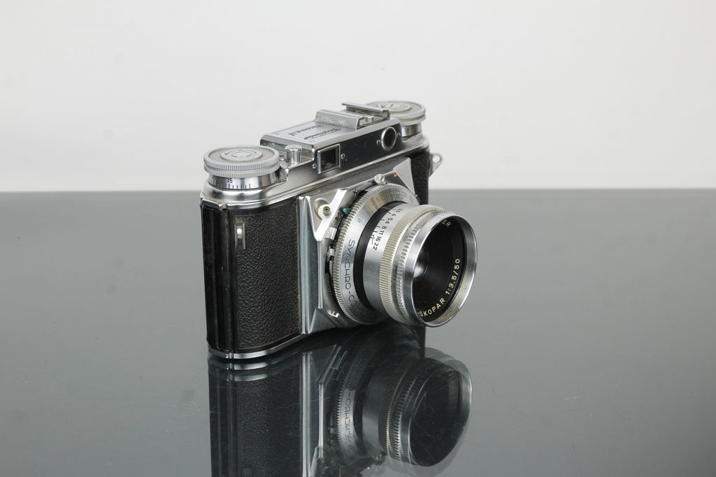Voigtländer Prominent + lente 50mm f/1.5 Nokton