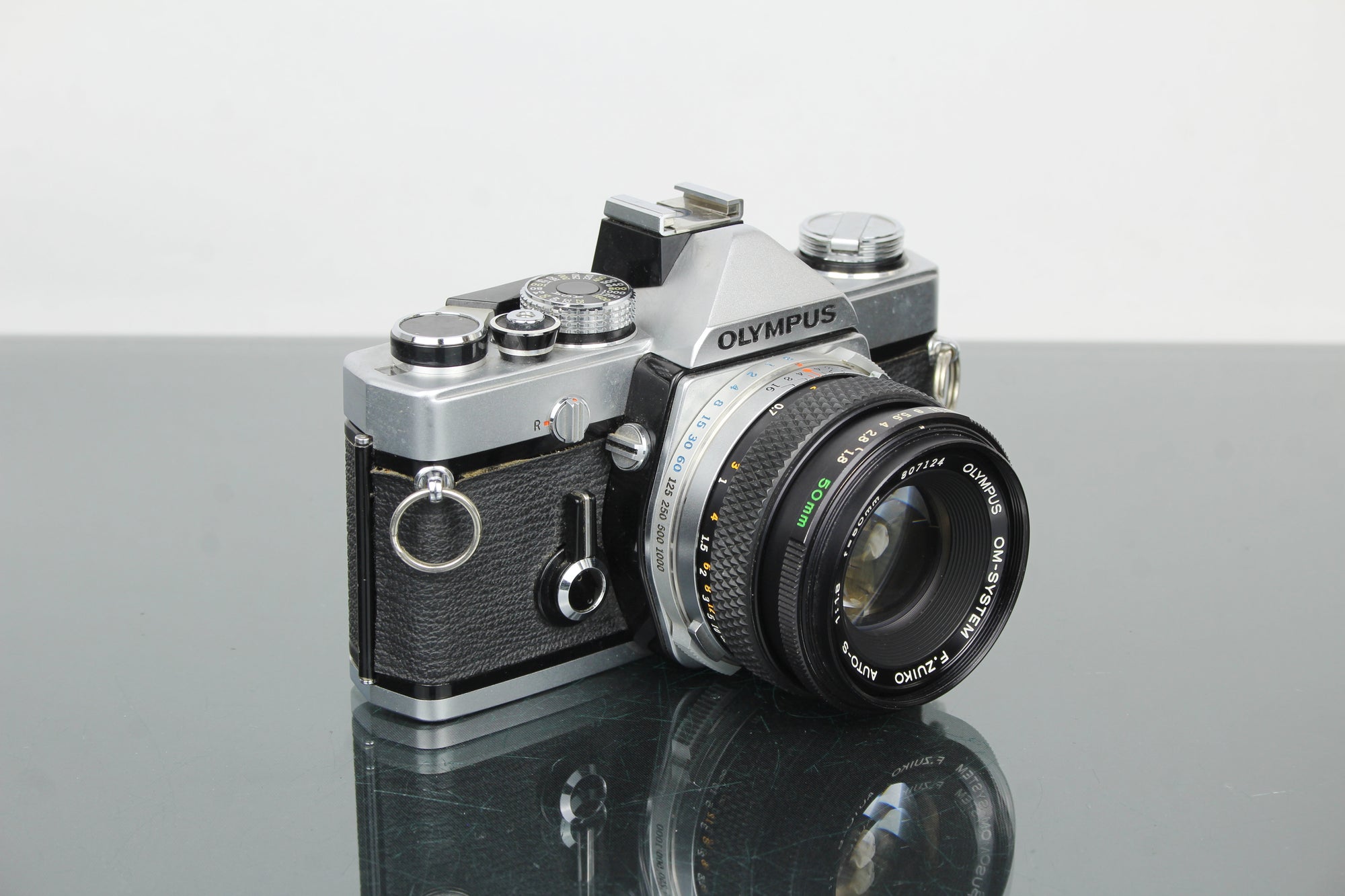 Olympus OM-1 + lente Olympus 50mm 1.8