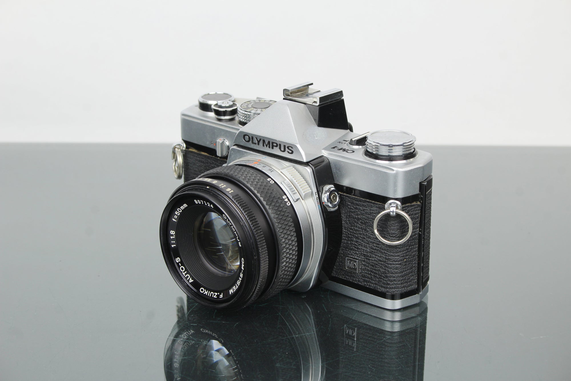 Olympus OM-1 + lente Olympus 50mm 1.8