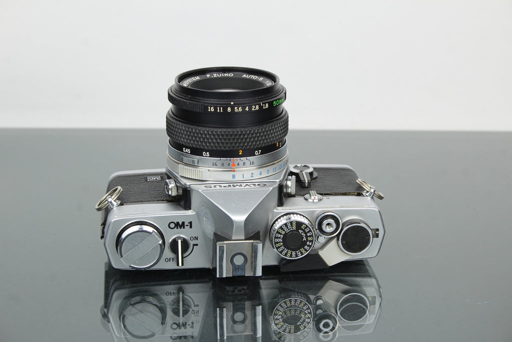 Olympus OM-1 + lente Olympus 50mm 1.8