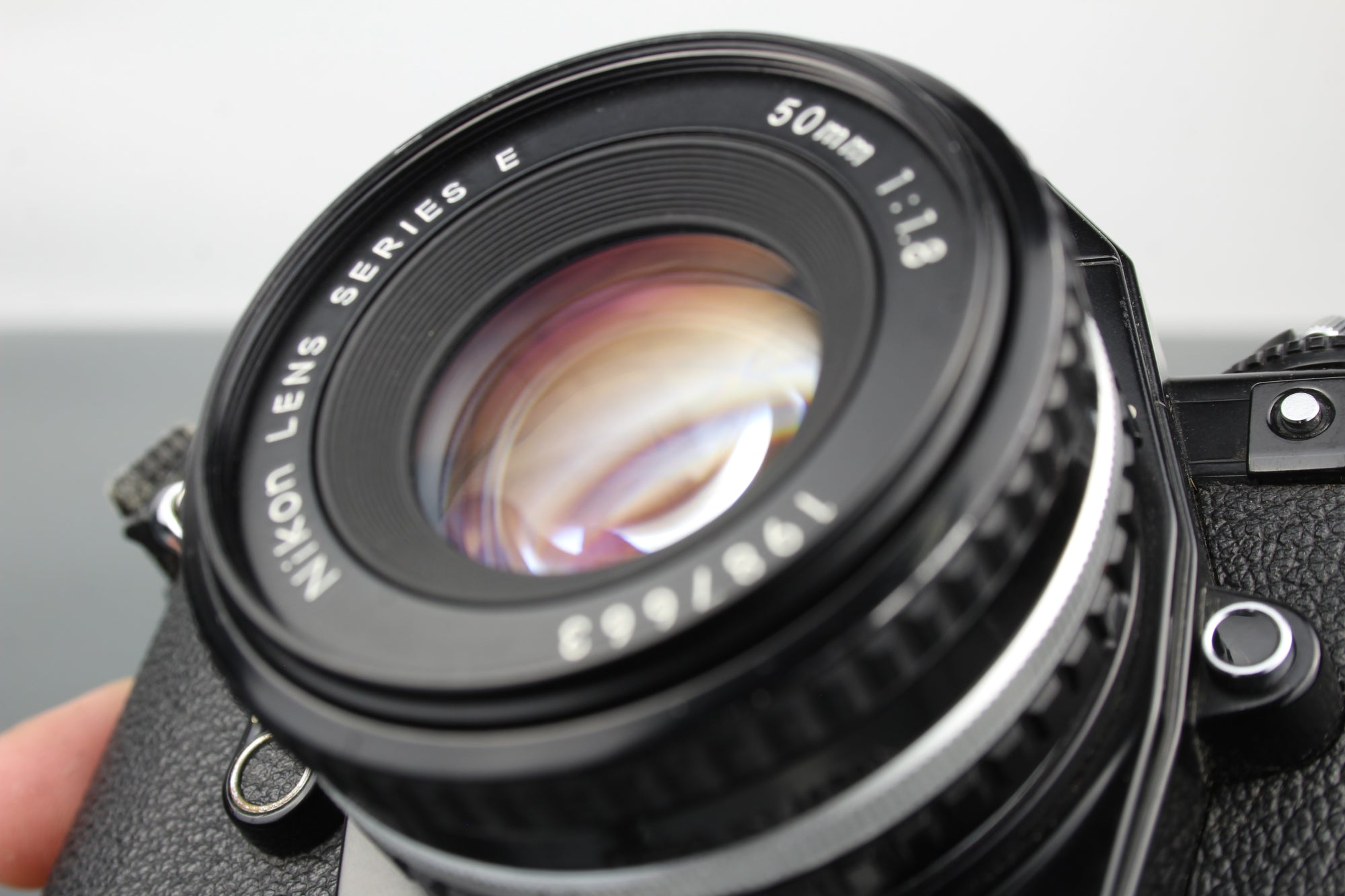 Nikon EM + 50mm 1:1.8 Series E lens