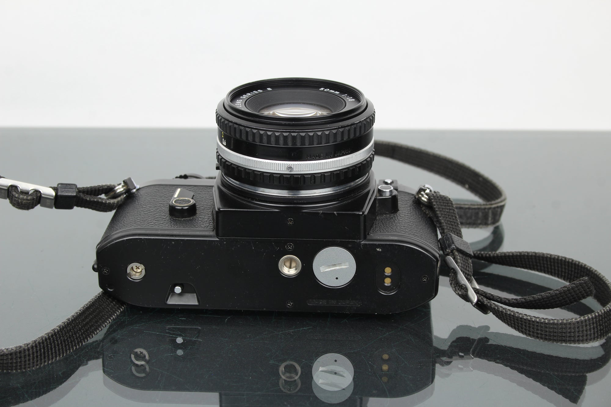 Nikon EM + 50mm 1:1.8 Series E lens