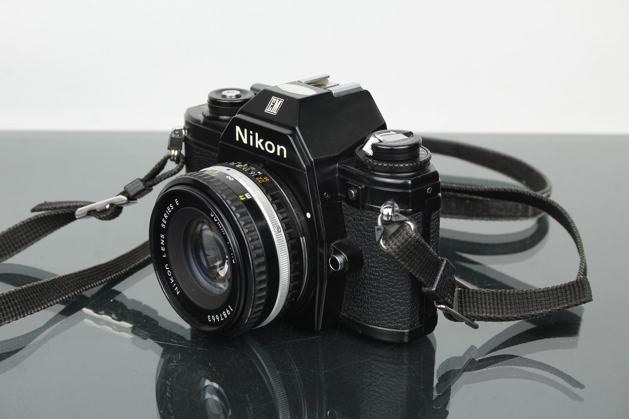 Nikon EM + 50mm 1:1.8 Series E lens