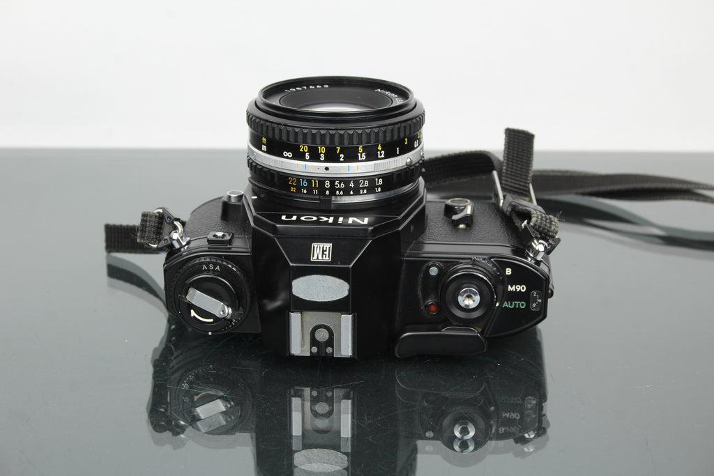 Nikon EM + 50mm 1:1.8 Series E lens