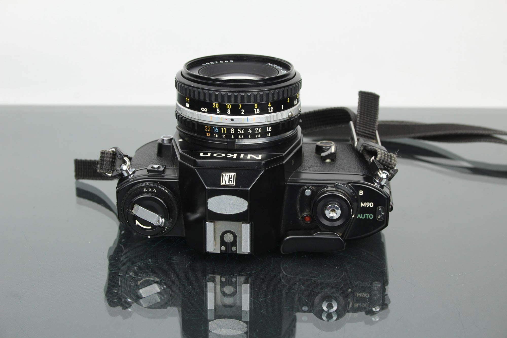 Nikon EM + 50mm 1:1.8 Series E lens