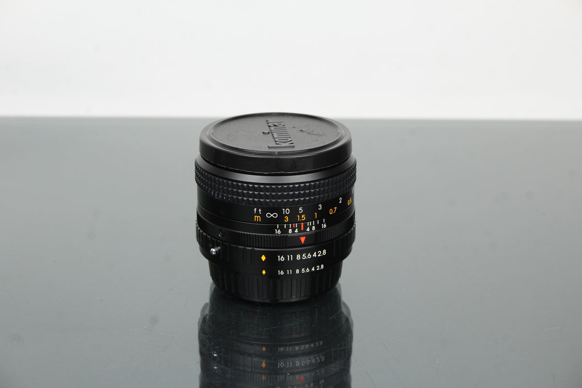 Kominar W 1:2.8 28mm Montagem Fujica