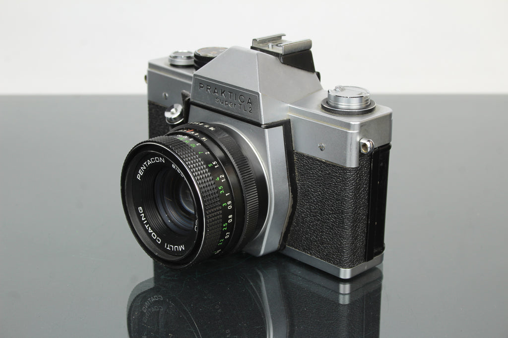 <tc>Praktica</tc> super TL2 + lente Pentacon elétrica 50mm 1.8 M42