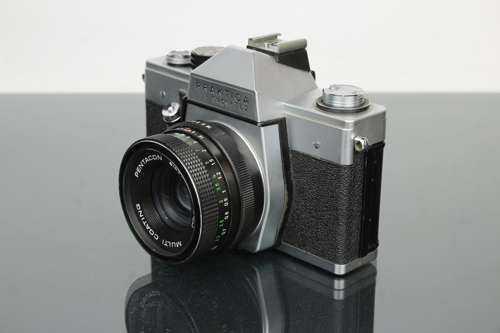 <tc>Praktica</tc> super TL2 + lente Pentacon elétrica 50mm 1.8 M42
