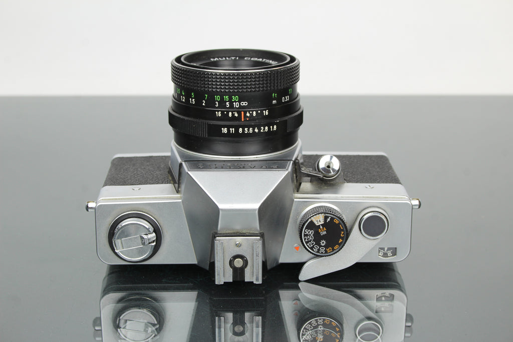 <tc>Praktica</tc> super TL2 + lente Pentacon elétrica 50mm 1.8 M42