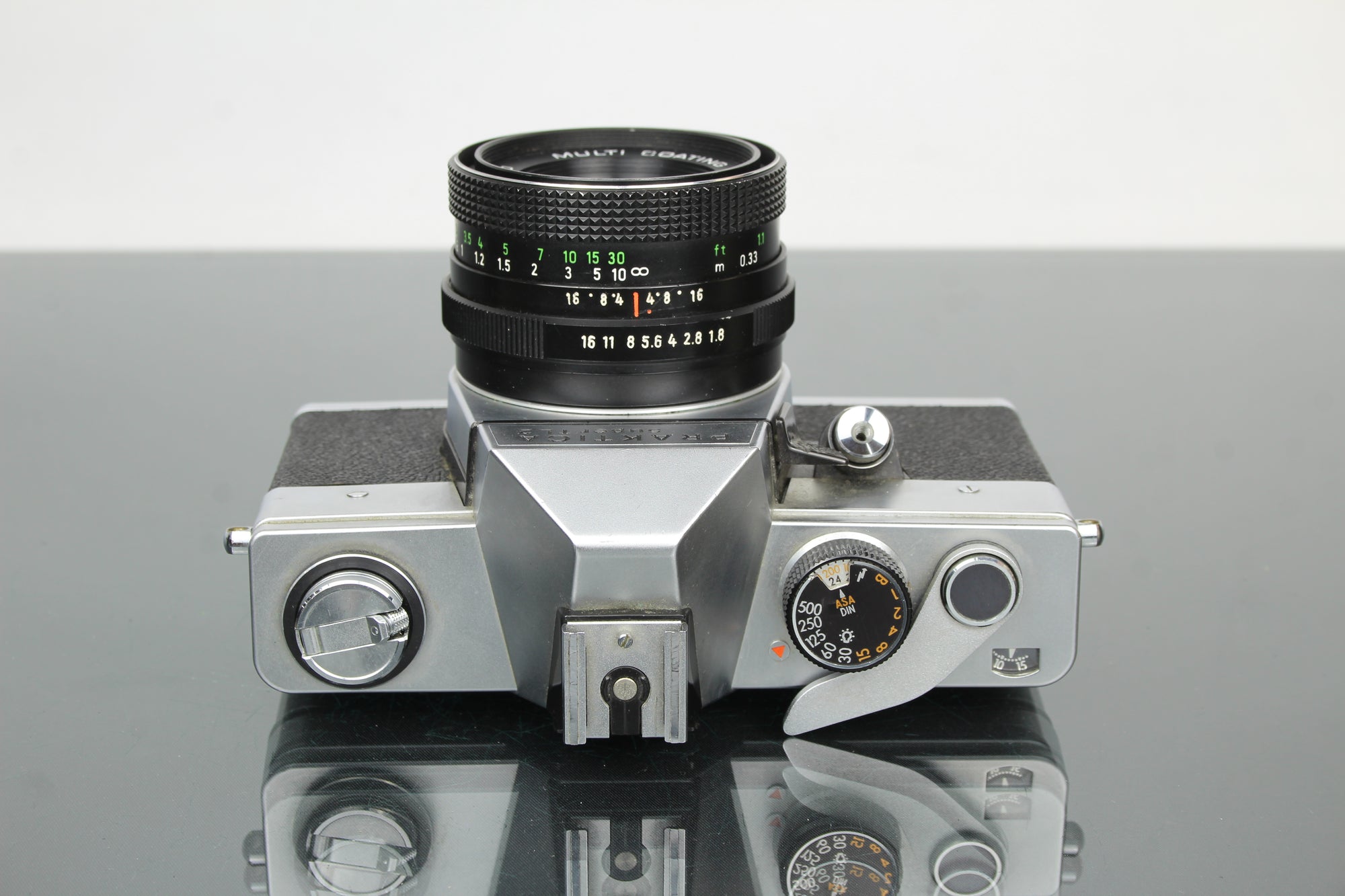 <tc>Praktica</tc> super TL2 + lente Pentacon elétrica 50mm 1.8 M42