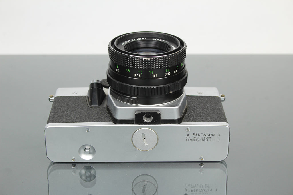 <tc>Praktica</tc> super TL2 + lente Pentacon elétrica 50mm 1.8 M42
