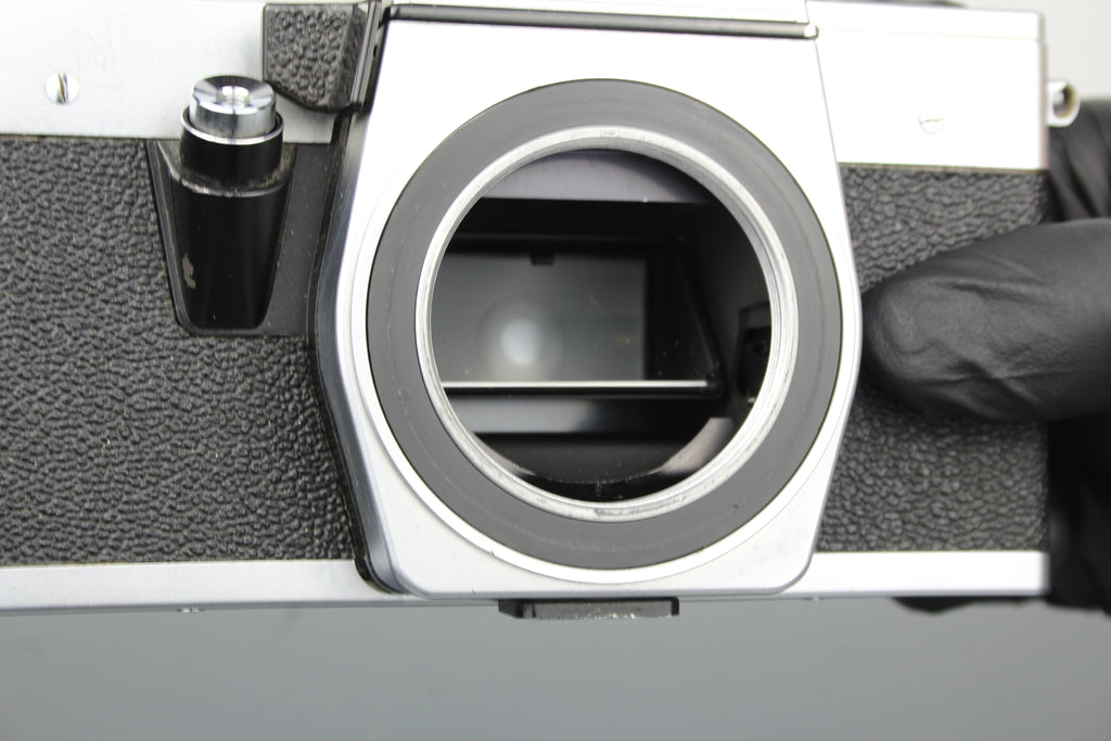 <tc>Praktica</tc> super TL2 + lente Pentacon elétrica 50mm 1.8 M42