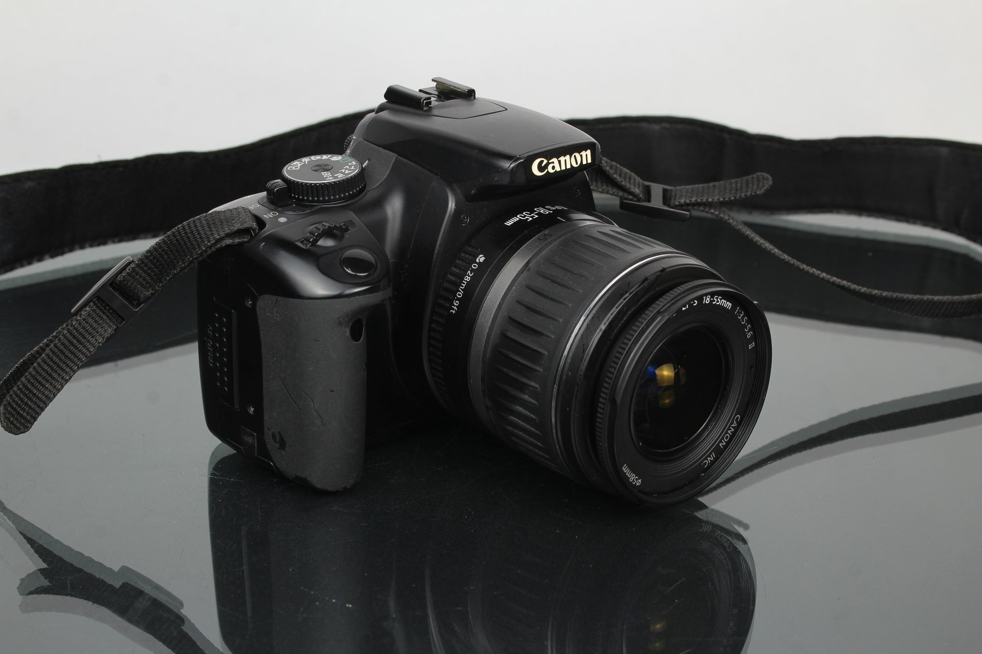 Canon EOS Rebel XTI + lente Canon EF-S 18-55mm 1:3.5-5.6